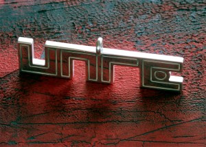 UNRE logo pendant