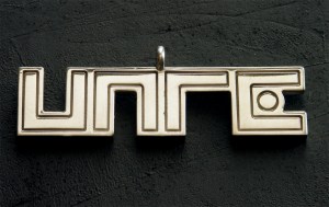 UNRE logo pendant